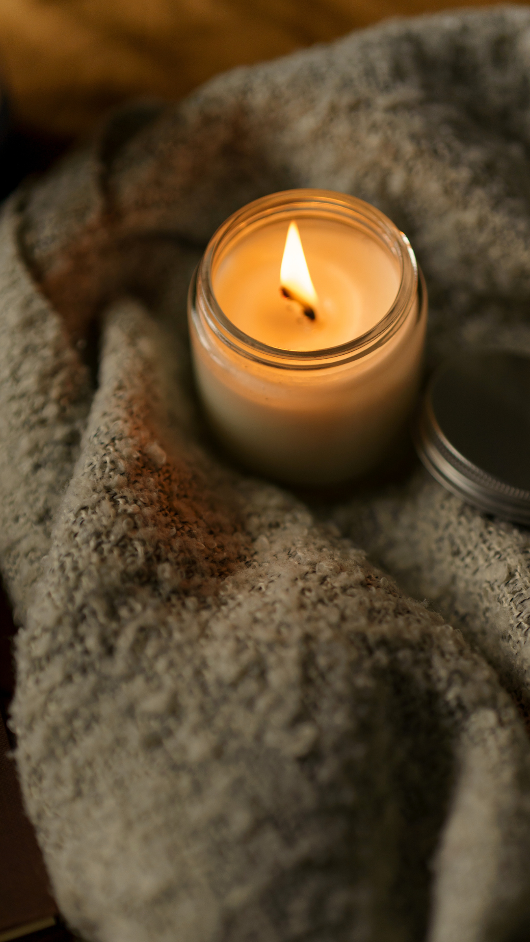 candela accesa nell'area head spa